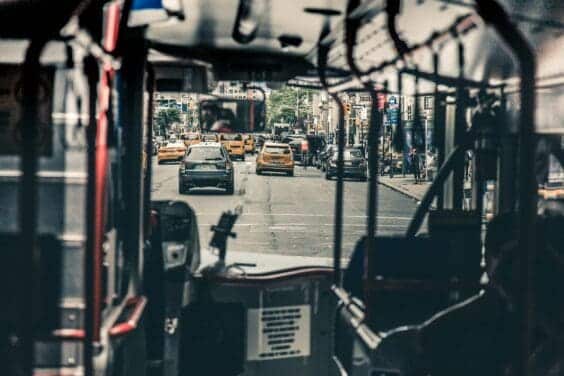 The New York City Bus System features comfortable seats and handrails for passengers