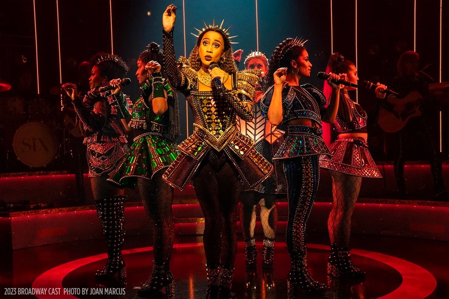 Six women singing on stage in unique costumes at the 'SIX' performance at Lena Horne Theatre