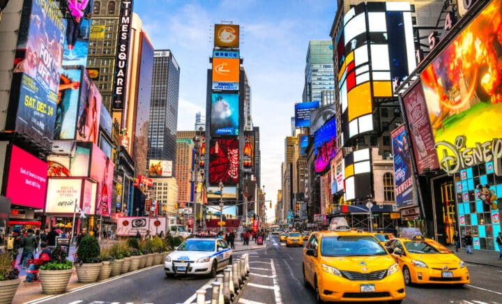 Times Square ,is a busy tourist intersection of neon art and commerce