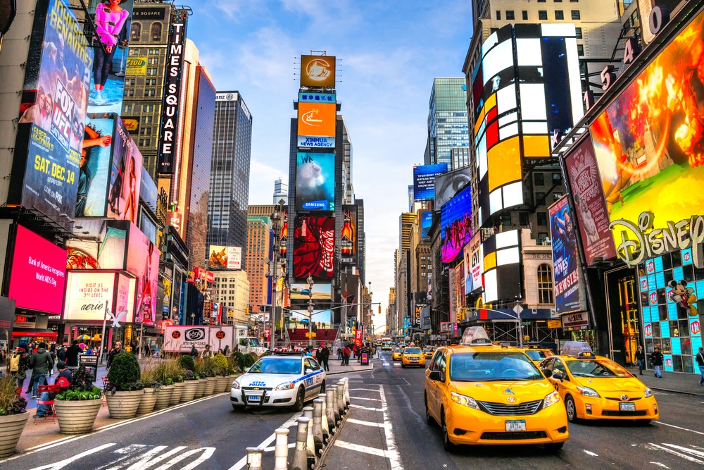 Times Square ,is a busy tourist intersection of neon art and commerce