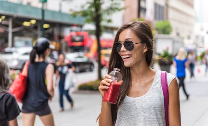 Woman walking on downtown street of New York city