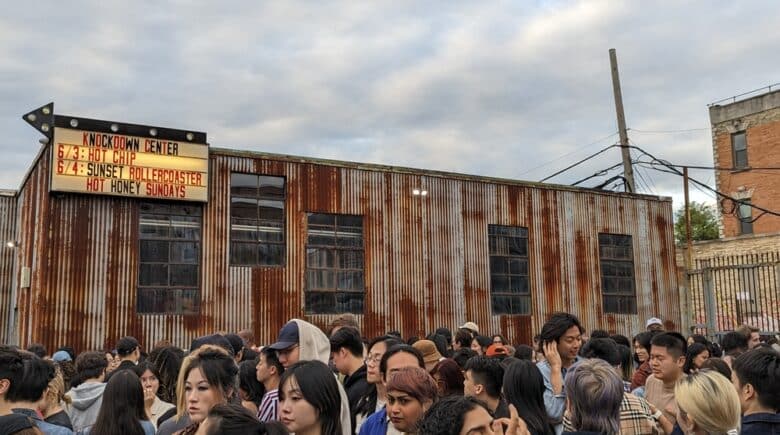 Queens, New York, USA - Crowd of concertgoers queued outside the Knockdown Center in Maspeth