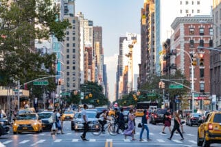 Street view of people walking in East Village neighborhood of Manhattan