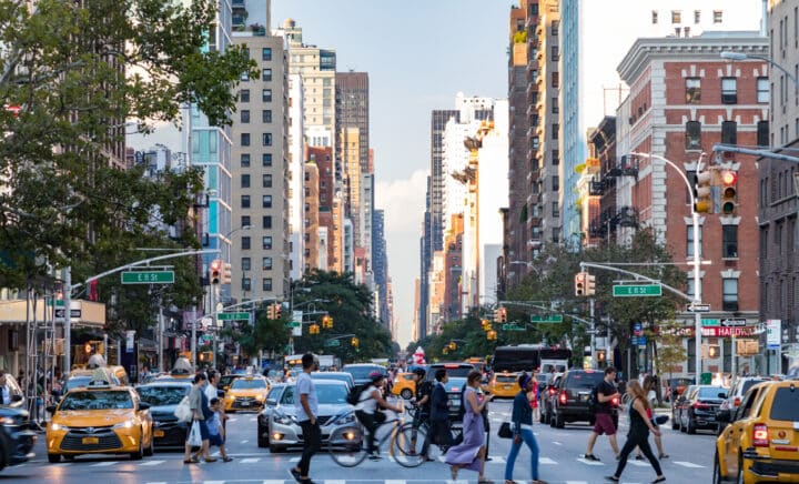 Street view of people walking in East Village neighborhood of Manhattan