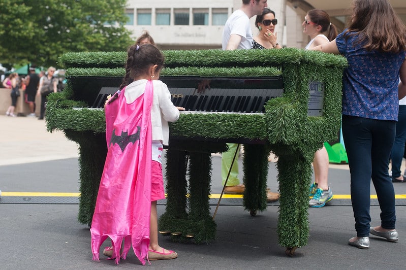 Batgirl Playing Sing for Hope Piano at Lincoln Center
