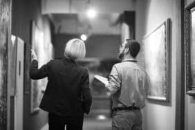 Man and woman discussing paintings at The Brooklyn Museum