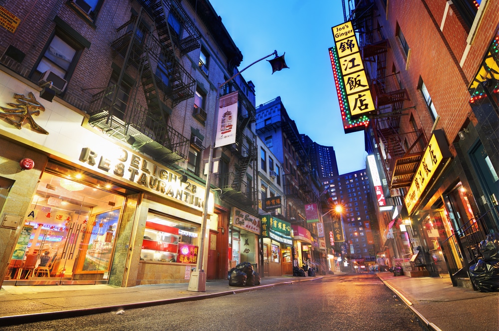 Pell St in Chinatown, NYC. A streety view showing stores and reataurants