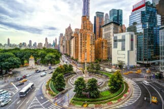 Columbus Circle in Manhattan showing traffic and tall buildings