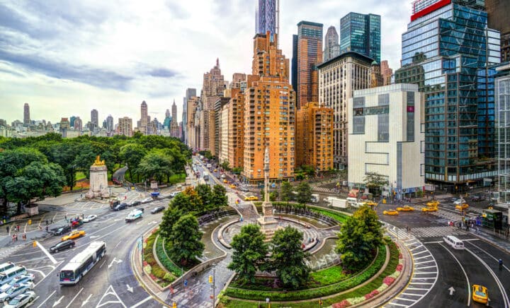 Columbus Circle in Manhattan showing traffic and tall buildings