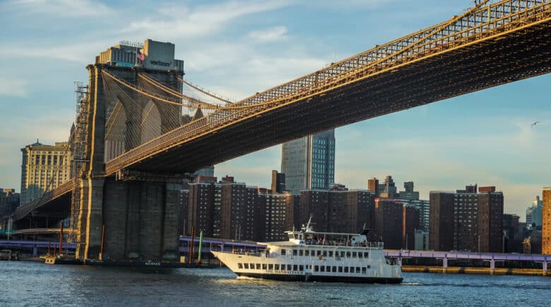 Yacht Manhattan II Cruise Boat under Brooklyn Bridge