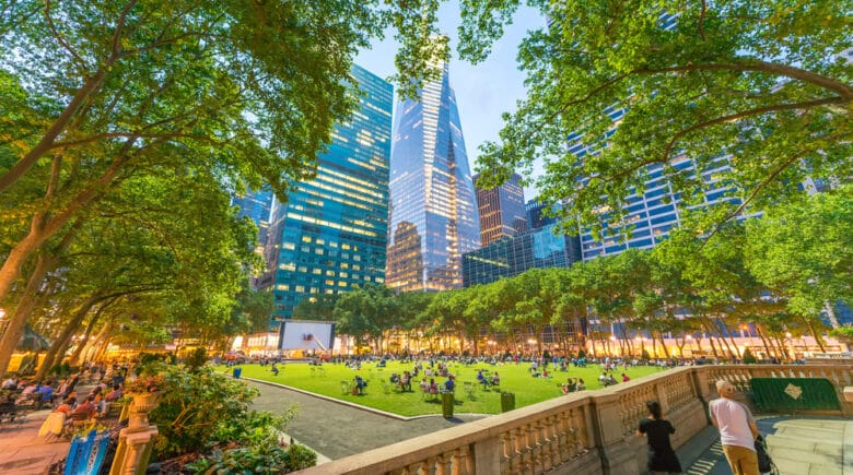 Relaxing in Bryant park after dusk. Manhattan, New York City