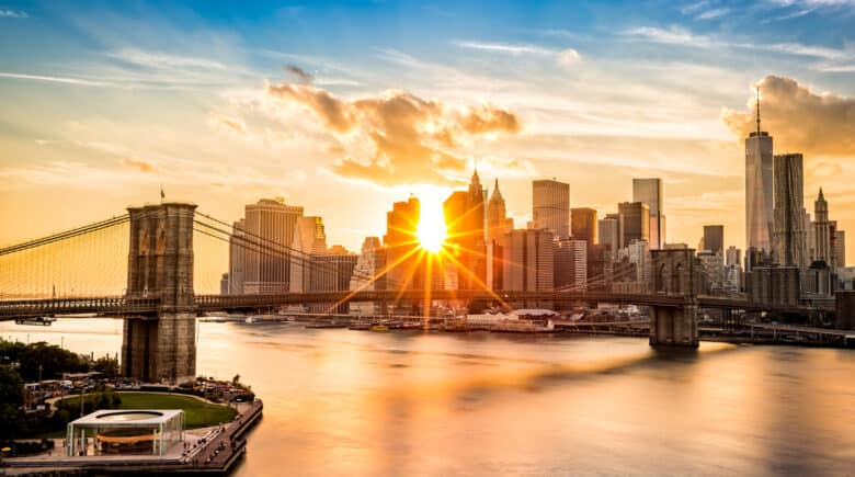 Brooklyn Bridge and the Lower Manhattan skyline at sunset