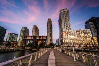 Pier and Long Island City at sunset, seen from Gantry Plaza State Park, Queens, New York.