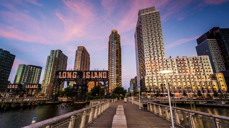 Pier and Long Island City at sunset, seen from Gantry Plaza State Park, Queens, New York.