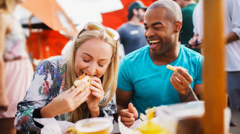 A couple enjoying a food outside