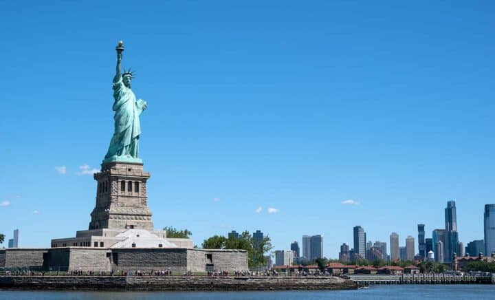 The Statue of Liberty at New York City on clear sunny day