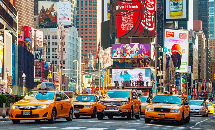 Yellow taxis along times Square in NYC