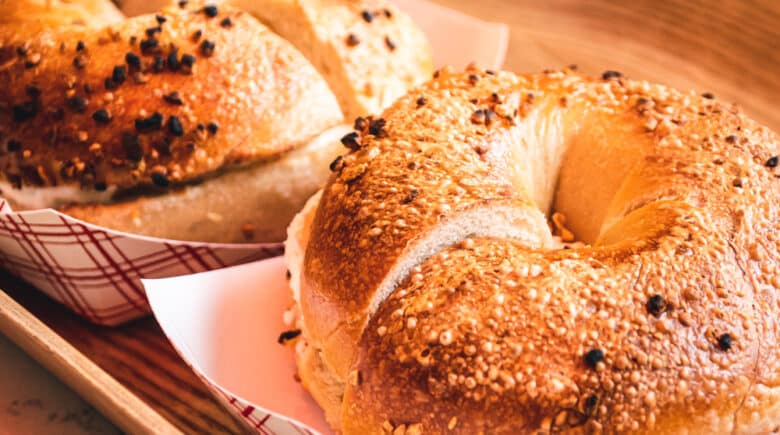 Freshly baked, crunchy typical NYC bagels with sesame