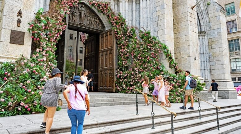 Flowers surround the doors of St. Patrick's Cathedral