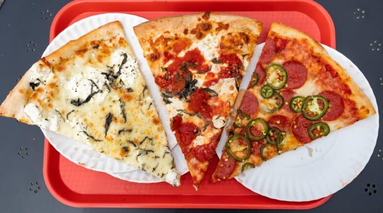 Three New York City Style Pizza Slices on a Tray