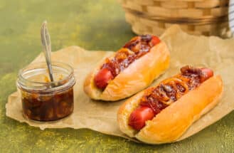 Homemade fast food, New York style hot dog with sausage and onion sauce