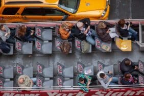 Tour bus riders seen from above looking down
