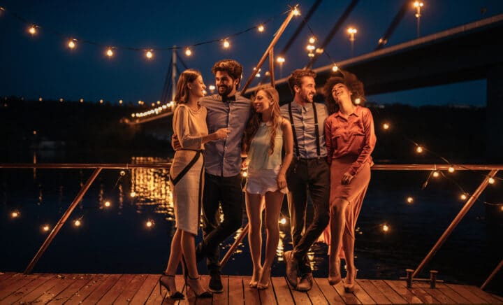 Shot of a group of friends having a great time at a boat cruise