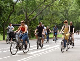 People riding bicycles in Central Park in New York