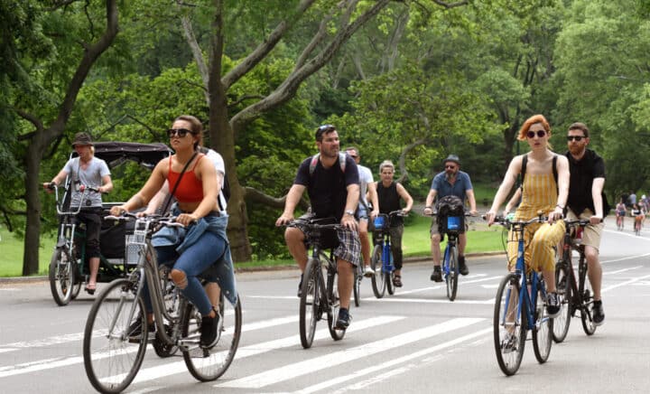 People riding bicycles in Central Park in New York