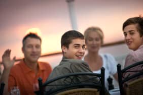 A family enjoying a relaxing brunch on a boat tour