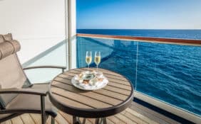 Champagne and caviar on balcony of cruise ship.