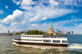 NYC Cruise passing by Liberty Island