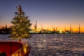 Christmas tree in the harbor at sundown