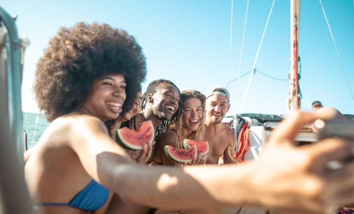 Young friends having fun on an NYC boat cruise