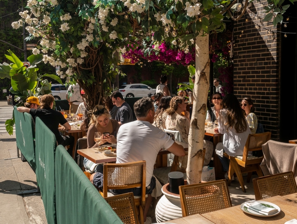 Al fresco diners take advantage of the warm weather in the Greenwich Village neighborhood of New York
