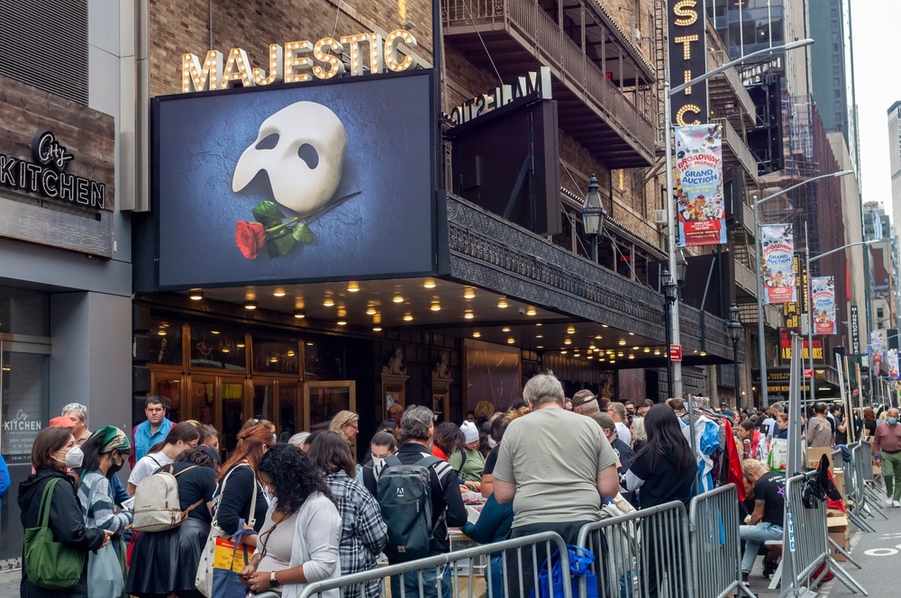 New York NY USA-September 25, 2022 Thousands of fans of Broadway crowd the Broadway Flea Market Grand Auction in New York to pour over and purchase memorabilia from Broadway shows like Phantom of the Opera