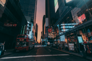 A bus on a sidewalk in New York City