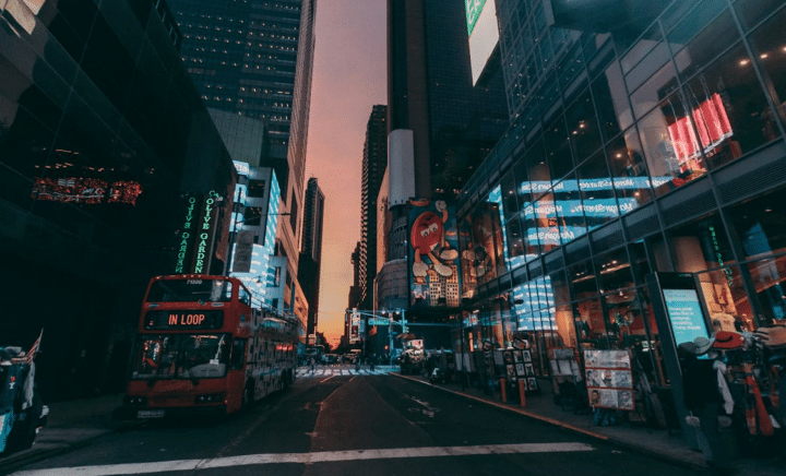 A bus on a sidewalk in New York City