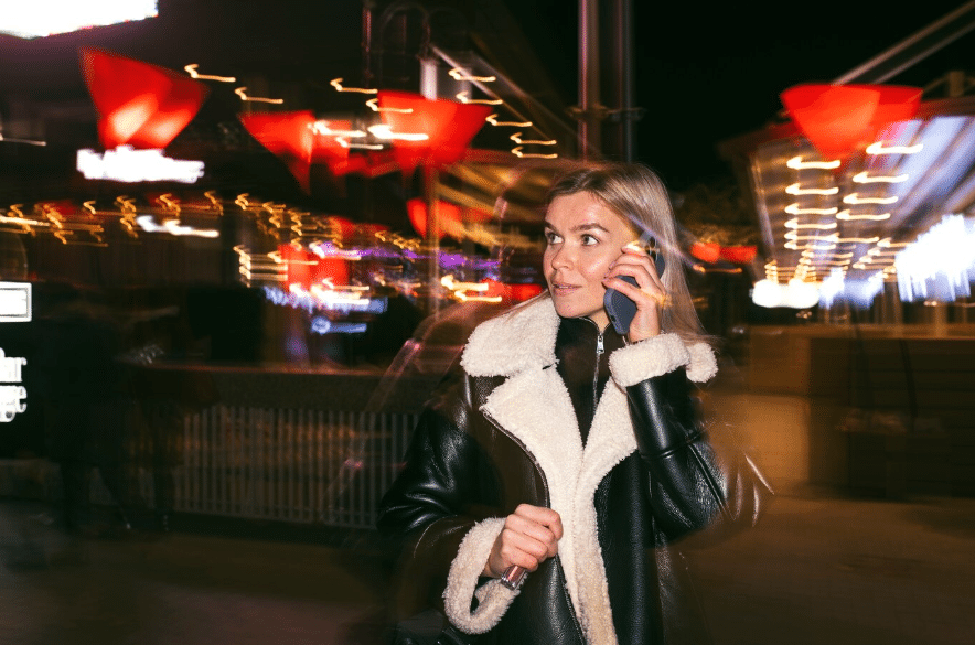 a woman posing outdoors