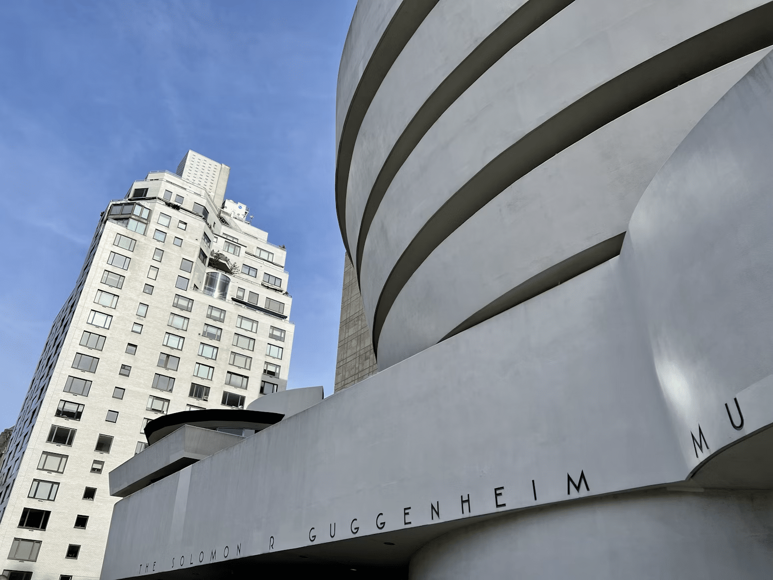 The Guggenheim Museum on 5th Avenue in Manhattan, NYC, with its unique spiral design.