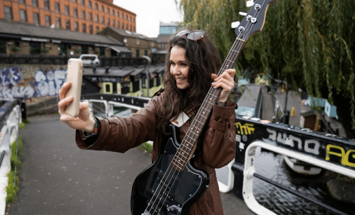 young musician singing around the city