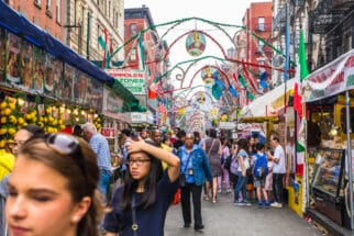 NEW YORK CITY - SEPTEMBER 21, 2017: View of the Annual Feast of San Gennaro street festival on the street of Little Italy in Manhattan with food vendors, decorations and real people in view.