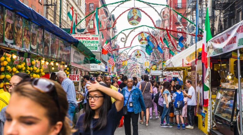 NEW YORK CITY - SEPTEMBER 21, 2017: View of the Annual Feast of San Gennaro street festival on the street of Little Italy in Manhattan with food vendors, decorations and real people in view.