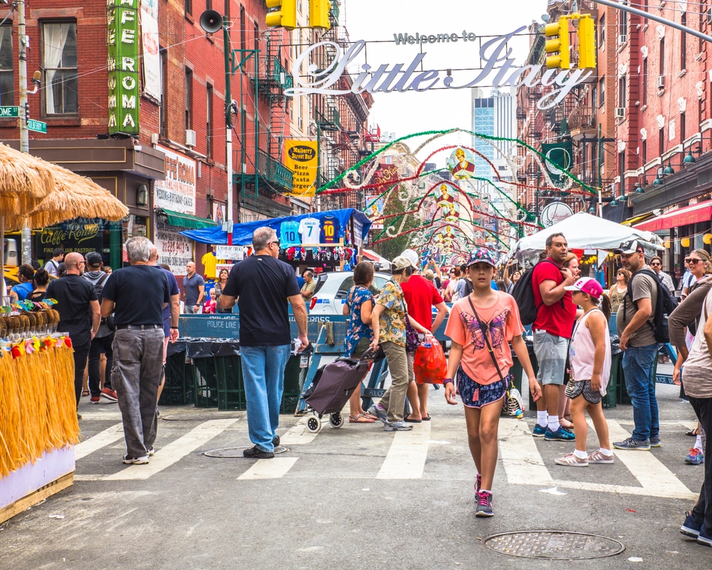 NEW YORK CITY - SEPTEMBER 21, 2017: View of the Annual Feast of San Gennaro street festival on the street of Little Italy in Manhattan with food vendors, decorations and real people in view.