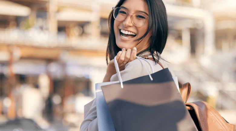 A woman holding shopping bags