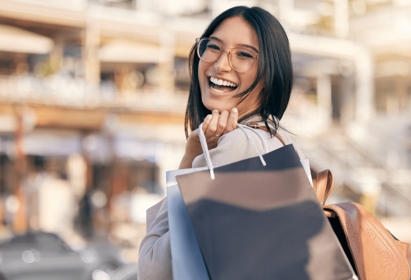 A woman holding shopping bags