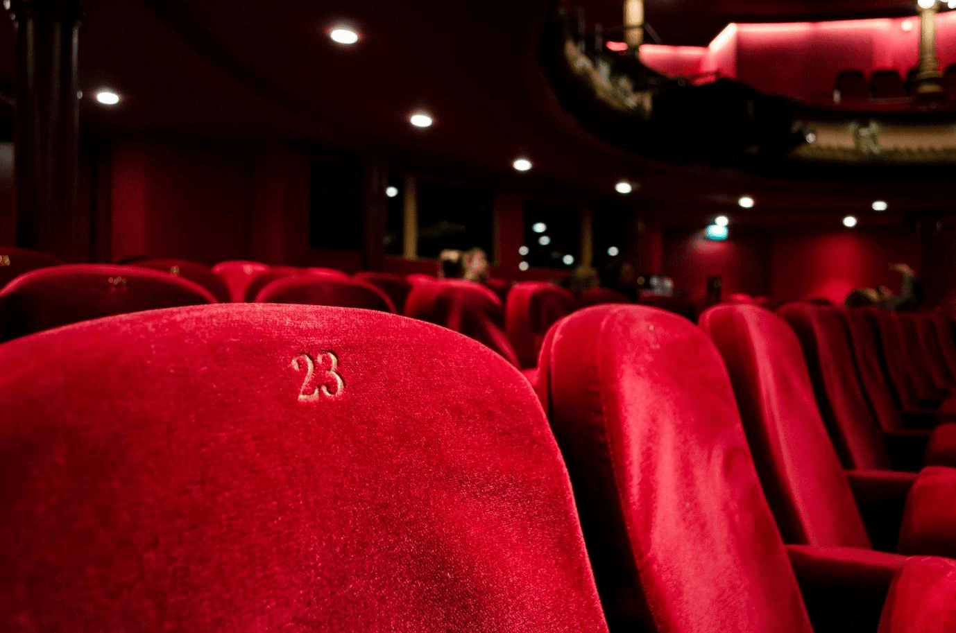 Rows of red velvet seats in a Broadway theater in New York City