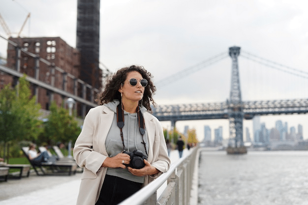 woman using the NYC travel guide to explore things to do in the outdoors