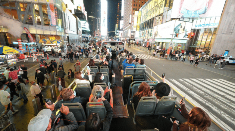 People on a bus touring the Times Square