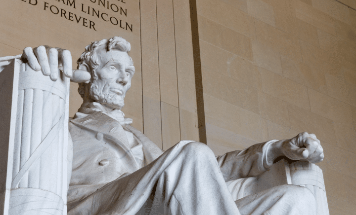 A statue of Abraham Lincoln seen as part of the New York City travel guide